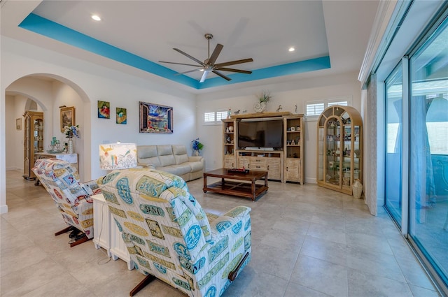 418 Aquamarine Way, Daytona Beach, FL 32124 - living area with arched walkways, a tray ceiling, recessed lighting, and ceiling fan