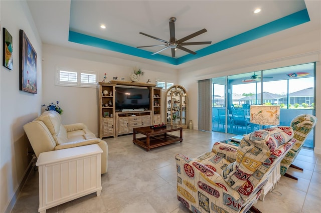 418 Aquamarine Way, Daytona Beach, FL 32124 - living area with baseboards, a raised ceiling, recessed lighting, and a ceiling fan