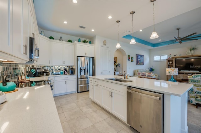 418 Aquamarine Way, Daytona Beach, FL 32124 - kitchen with open floor plan, a sink, arched walkways, visible vents, and appliances with stainless steel finishes