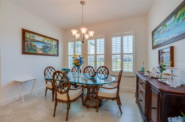 418 Aquamarine Way, Daytona Beach, FL 32124 - dining area featuring baseboards and a notable chandelier