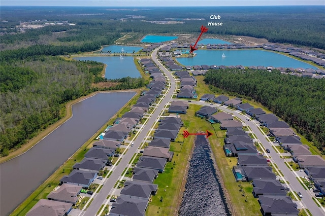 418 Aquamarine Way, Daytona Beach, FL 32124 - drone / aerial view featuring a wooded view, a water view, and a residential view