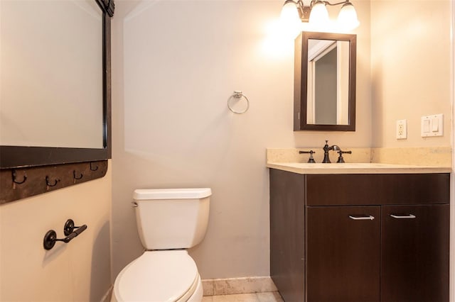 35 Brockton Ln, Palm Coast, FL 32137 - half bath featuring toilet, tile patterned floors, vanity, and baseboards