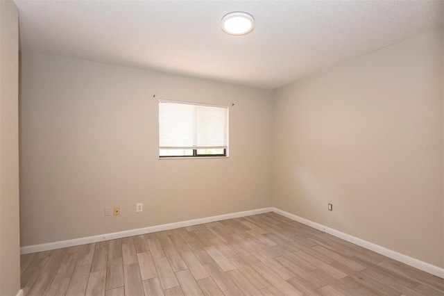 35 Brockton Ln, Palm Coast, FL 32137 - empty room featuring light wood finished floors and baseboards