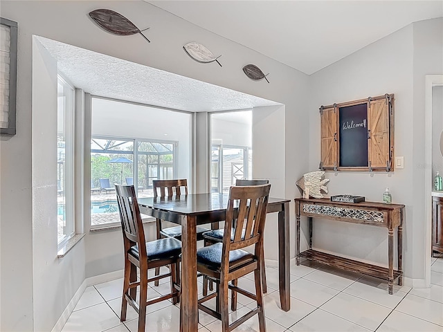 1578 Stone Trl, Deltona, FL 32725 - dining room with baseboards and light tile patterned floors