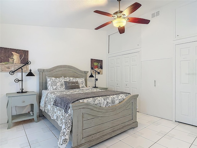 1578 Stone Trl, Deltona, FL 32725 - bedroom with light tile patterned floors, a closet, and a ceiling fan