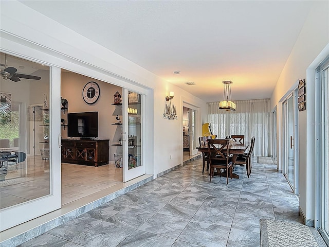 1578 Stone Trl, Deltona, FL 32725 - dining space with light marble finish flooring and ceiling fan