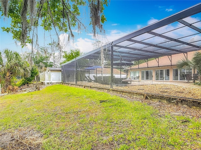 1578 Stone Trl, Deltona, FL 32725 - view of green lawn featuring a lanai