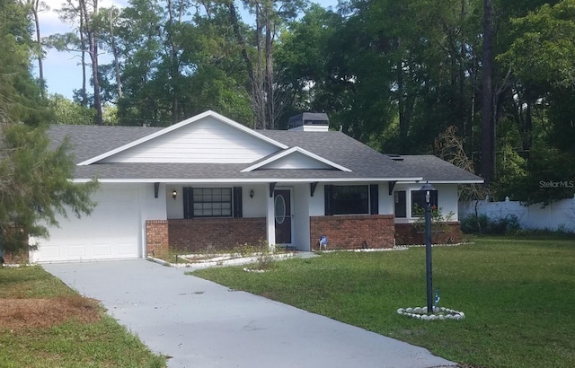 single story home featuring an attached garage, brick siding, a front lawn, driveway, and a shingled roof