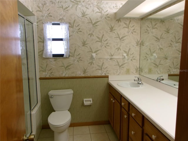 full bathroom featuring vanity, toilet, baseboards, wallpapered walls, and tile patterned floors