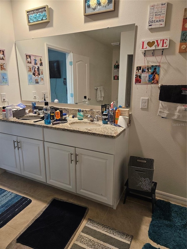 209 Meghan Cir, Deland, FL 32724 - full bathroom featuring double vanity and tile patterned floors