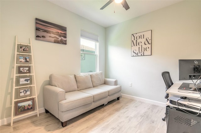 3128 Crab Trap Dr, New Smyrna Beach, FL 32168 - office with a ceiling fan, light wood-type flooring, and baseboards