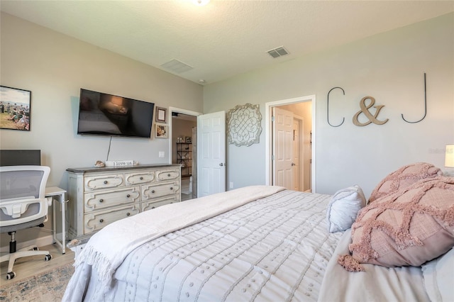 3128 Crab Trap Dr, New Smyrna Beach, FL 32168 - bedroom with light wood-style flooring