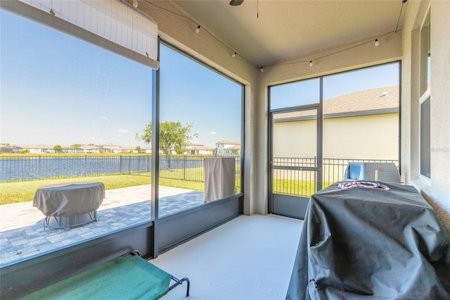 3128 Crab Trap Dr, New Smyrna Beach, FL 32168 - sunroom / solarium with a ceiling fan and a water view