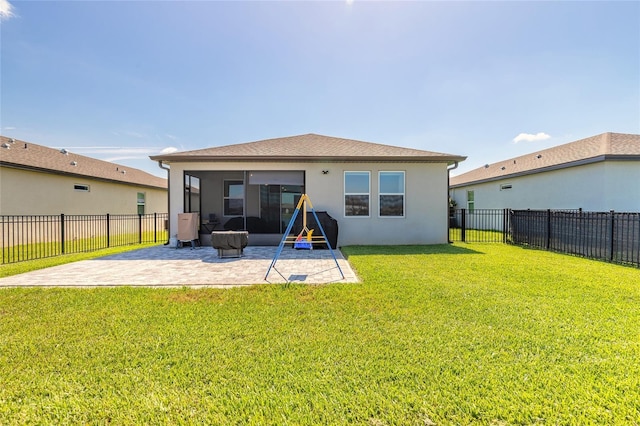 3128 Crab Trap Dr, New Smyrna Beach, FL 32168 - back of property with a patio area and stucco siding