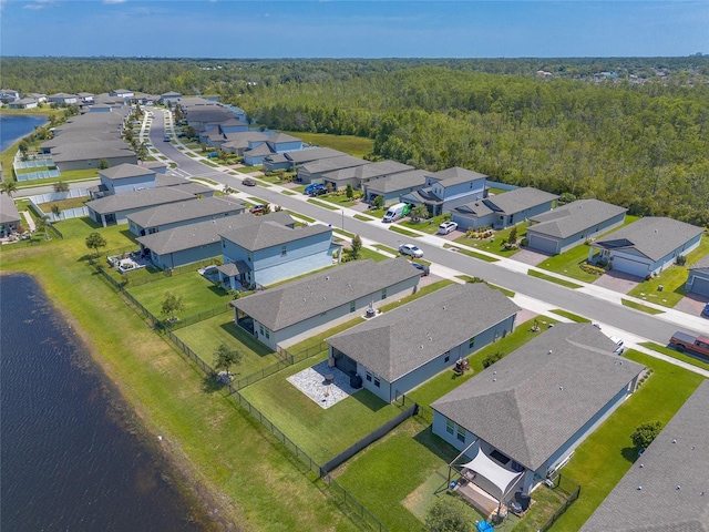 3128 Crab Trap Dr, New Smyrna Beach, FL 32168 - aerial view of residential area featuring a forest and a nearby body of water