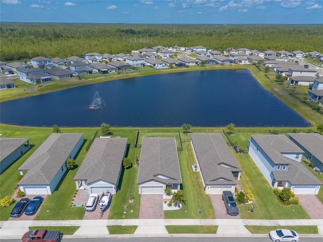 3128 Crab Trap Dr, New Smyrna Beach, FL 32168 - aerial perspective of suburban area with a heavily wooded area and a nearby body of water