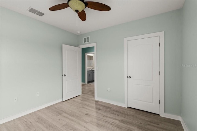 3120 Areca Ave, New Smyrna Beach, FL 32168 - unfurnished bedroom with light wood-style flooring, baseboards, and visible vents