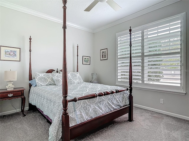 425 Wedgeworth Ln, Deland, FL 32724 - carpeted bedroom featuring a textured ceiling, ornamental molding, baseboards, and ceiling fan