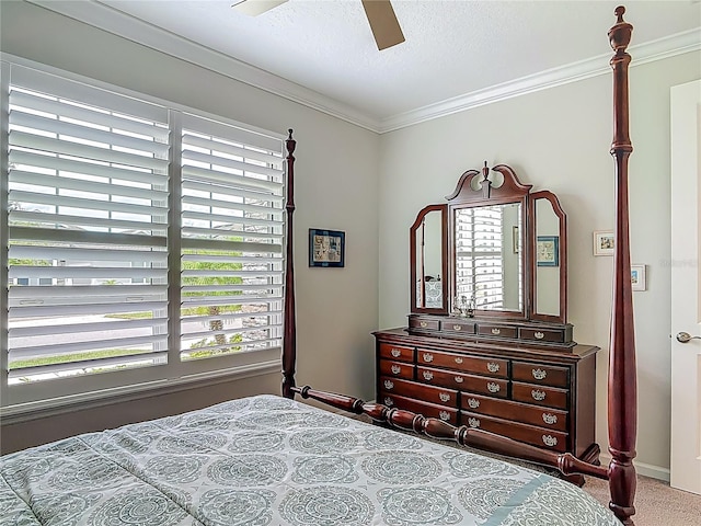 425 Wedgeworth Ln, Deland, FL 32724 - bedroom with carpet flooring, a textured ceiling, baseboards, ornamental molding, and a ceiling fan