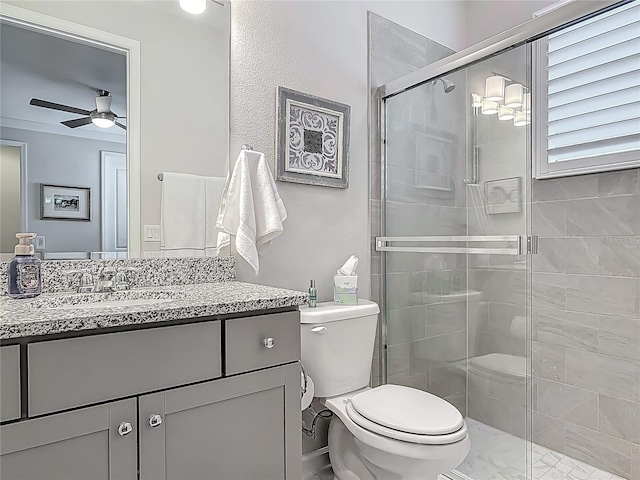425 Wedgeworth Ln, Deland, FL 32724 - full bathroom featuring a stall shower, toilet, ceiling fan, and vanity