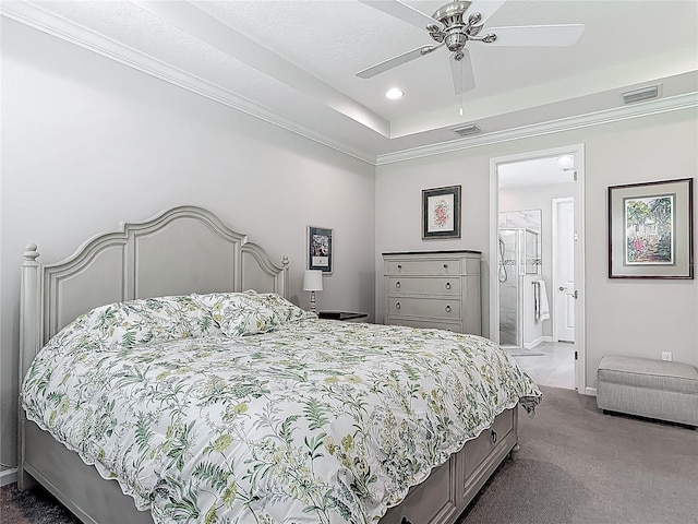 425 Wedgeworth Ln, Deland, FL 32724 - bedroom with ornamental molding, dark carpet, ensuite bathroom, and visible vents