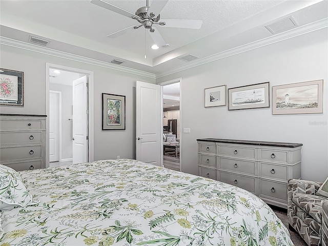 425 Wedgeworth Ln, Deland, FL 32724 - bedroom with ornamental molding, visible vents, and ceiling fan