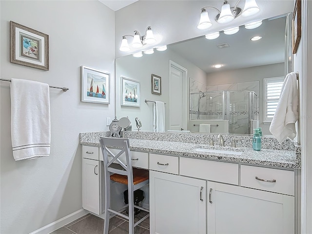 425 Wedgeworth Ln, Deland, FL 32724 - bathroom with a stall shower, vanity, tile patterned flooring, visible vents, and an inviting chandelier