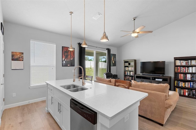 1601 Toledo Ave, Deltona, FL 32725 - kitchen featuring visible vents, dishwasher, a sink, ceiling fan, and light wood finished floors
