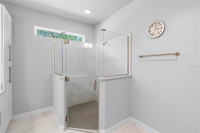 1601 Toledo Ave, Deltona, FL 32725 - bathroom featuring baseboards, a shower stall, and a textured ceiling