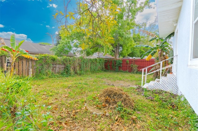 5261 3rd St, Orlando, FL 32810 - view of yard featuring a fenced backyard