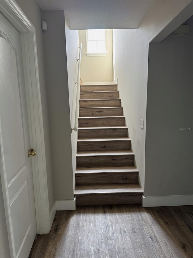 508 Tracey Dr, Panama City, FL 32404 - staircase with baseboards and wood finished floors