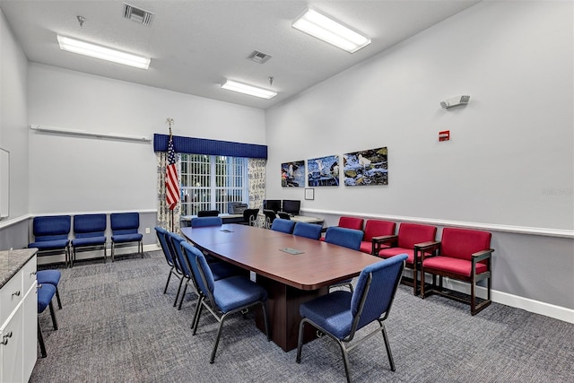 5305 Indian Ocean Loop, Tavares, FL 32778 - dining area featuring carpet floors and baseboards