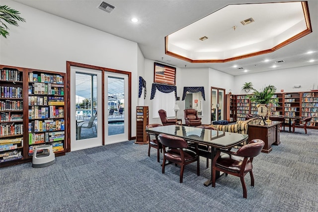 5305 Indian Ocean Loop, Tavares, FL 32778 - dining space featuring carpet floors, french doors, recessed lighting, and a raised ceiling