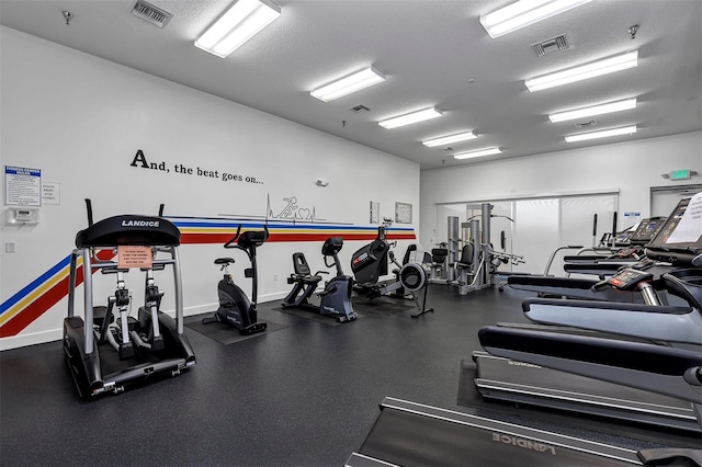 5305 Indian Ocean Loop, Tavares, FL 32778 - workout area featuring baseboards