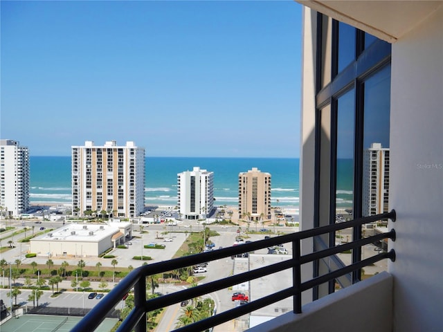 balcony featuring a water view
