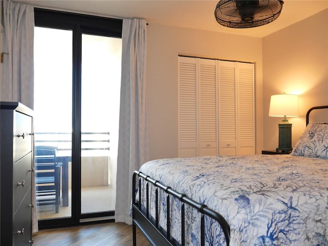bedroom featuring wood finished floors and a closet