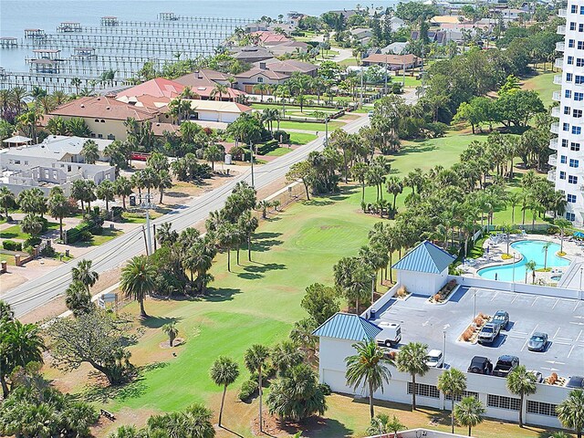 birds eye view of property featuring a water view and golf course view