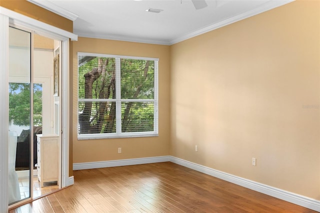 508 Quail Lake Dr, Debary, FL 32713 - empty room with baseboards, light wood-type flooring, crown molding, and ceiling fan
