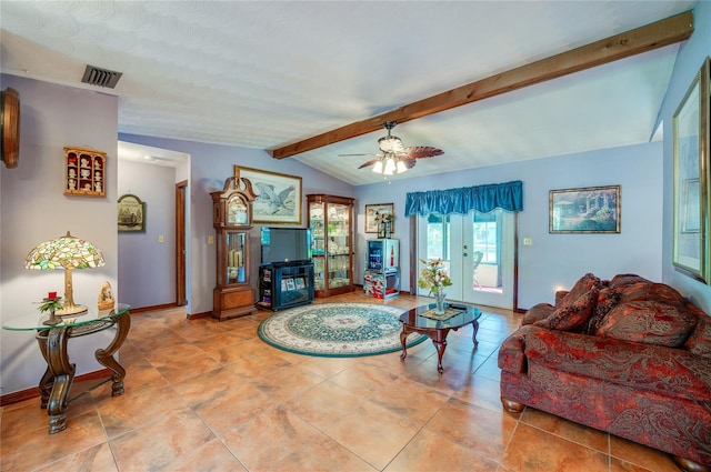 living room featuring lofted ceiling with beams, baseboards, visible vents, a ceiling fan, and tile patterned flooring