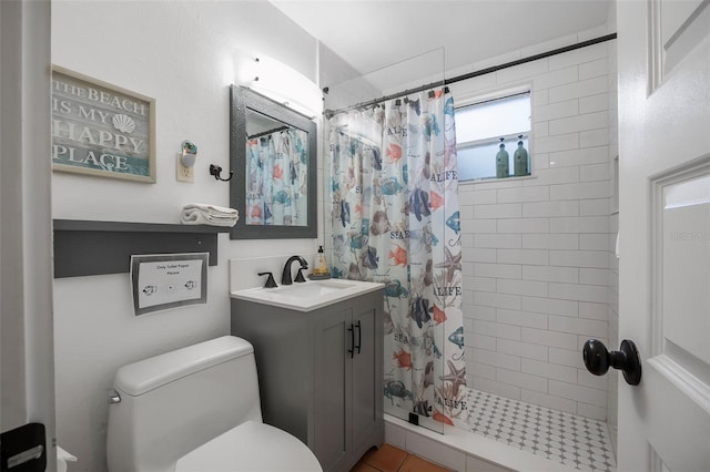 82 Margaret Rd, Ormond Beach, FL 32176 - full bathroom with toilet, tiled shower, and vanity