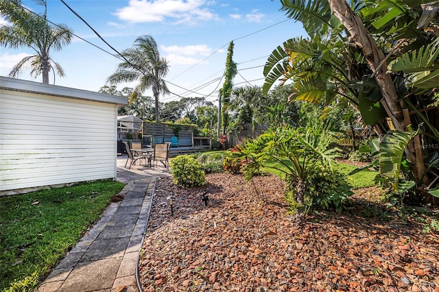 82 Margaret Rd, Ormond Beach, FL 32176 - view of yard featuring a patio and fence