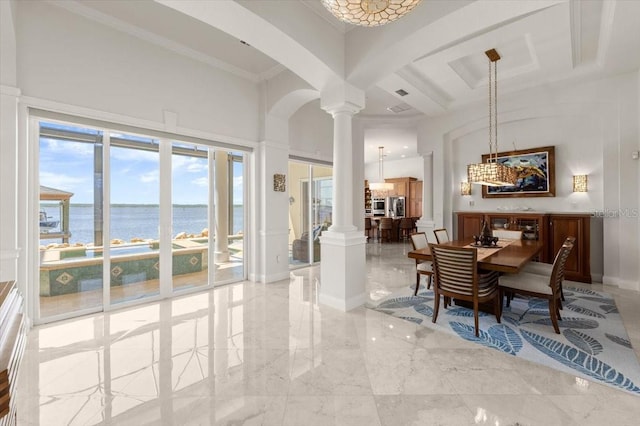 3310 John Anderson Dr, Ormond Beach, FL 32176 - interior space with a water view, ornate columns, arched walkways, and a towering ceiling