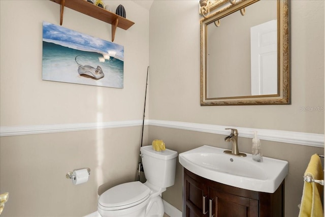 3310 John Anderson Dr, Ormond Beach, FL 32176 - bathroom featuring toilet and vanity