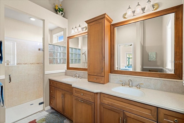 3310 John Anderson Dr, Ormond Beach, FL 32176 - full bathroom featuring a sink, a tile shower, and double vanity