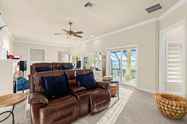 3310 John Anderson Dr, Ormond Beach, FL 32176 - living room featuring light carpet, visible vents, baseboards, and a ceiling fan