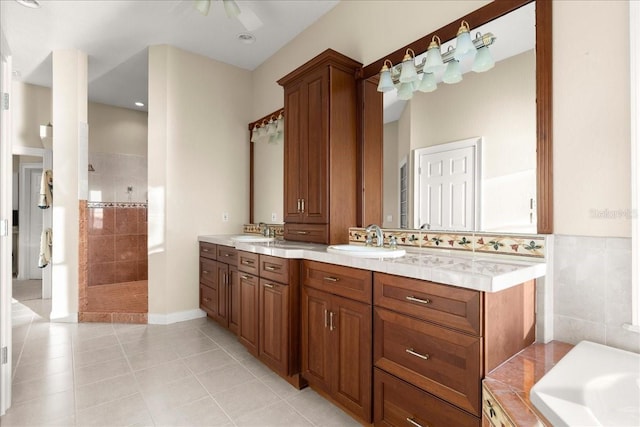 3310 John Anderson Dr, Ormond Beach, FL 32176 - bathroom with a walk in shower, tile patterned floors, double vanity, and a sink
