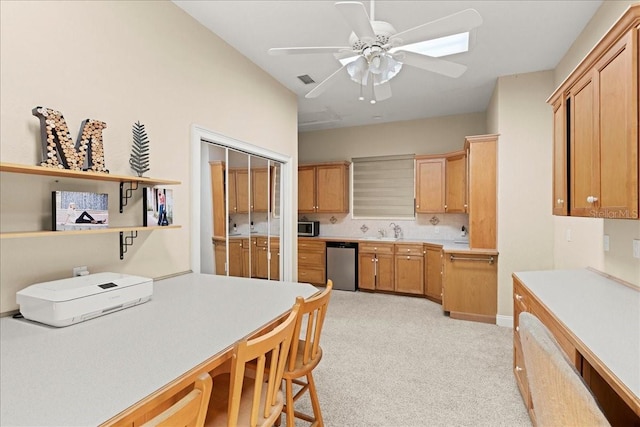 3310 John Anderson Dr, Ormond Beach, FL 32176 - kitchen with tasteful backsplash, a sink, light countertops, ceiling fan, and stainless steel appliances
