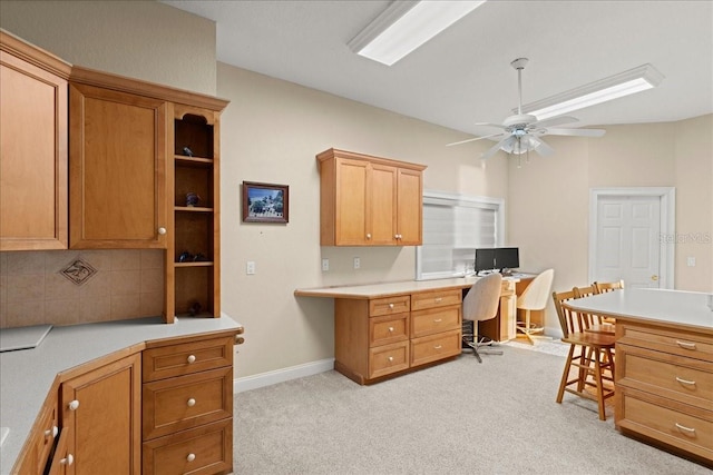 3310 John Anderson Dr, Ormond Beach, FL 32176 - office space featuring built in study area, ceiling fan, light colored carpet, and baseboards