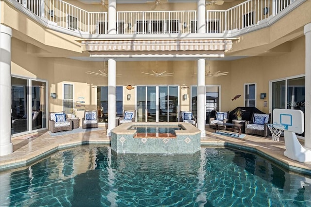 3310 John Anderson Dr, Ormond Beach, FL 32176 - view of swimming pool featuring a patio area, a pool with connected hot tub, and a ceiling fan
