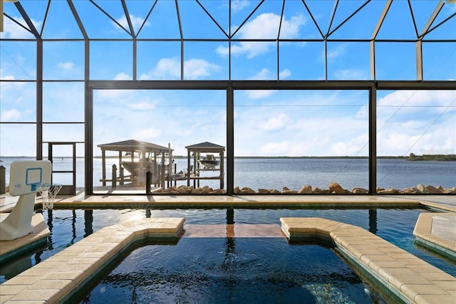 3310 John Anderson Dr, Ormond Beach, FL 32176 - dock area with a water view, a pool with connected hot tub, and glass enclosure